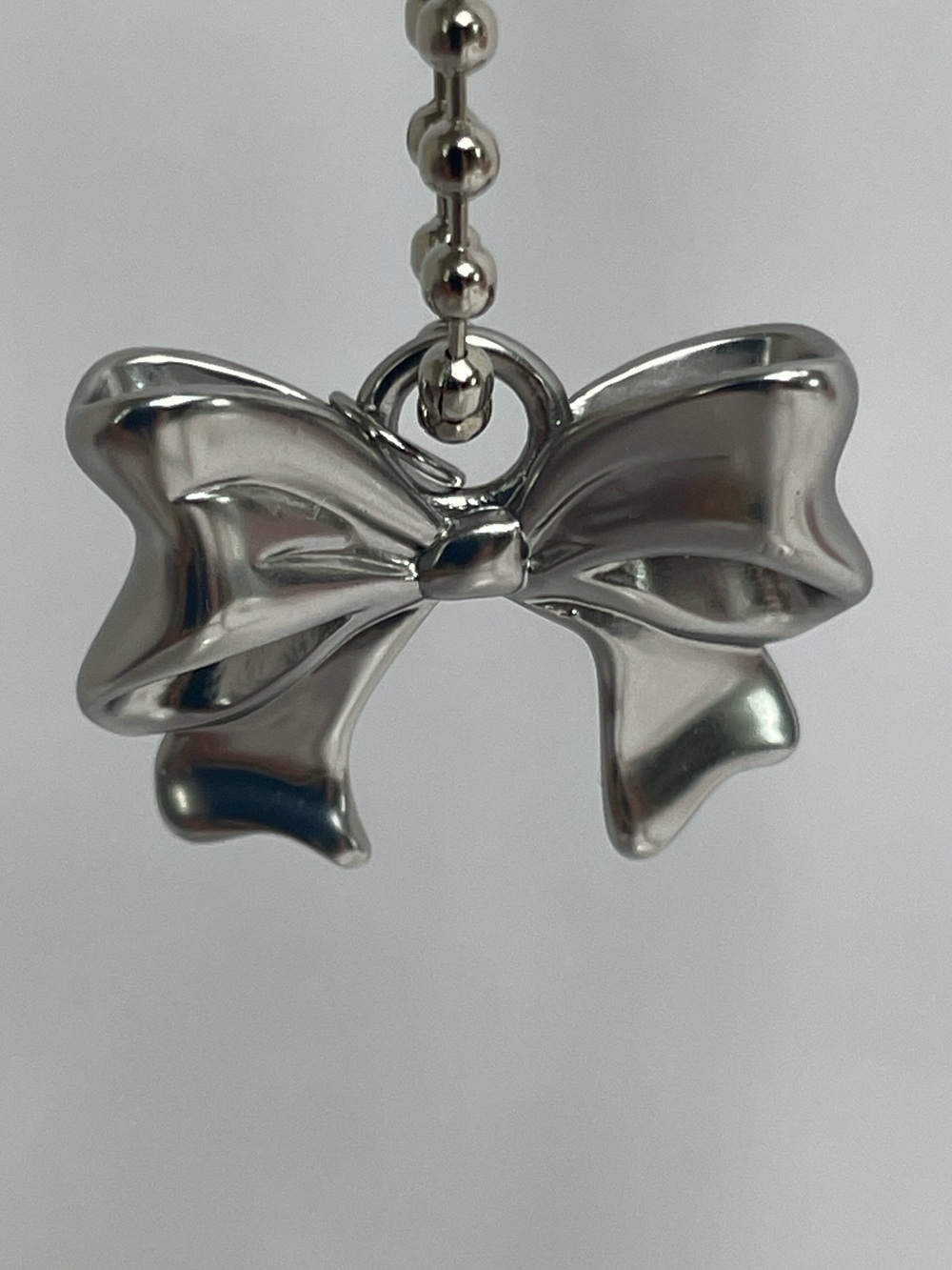 Coach New York Exclusive Silver Bow Charm